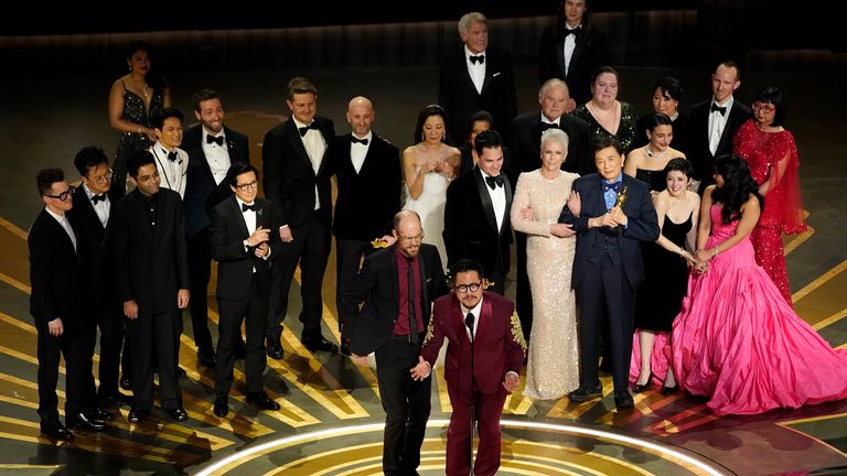 The cast and crew of &#34;Everything Everywhere All at Once&#34; accepts the award for best picture at the Oscars on Sunday, March 12, 2023, at the Dolby Theatre in Los Angeles. (AP Photo/Chris Pizzello)