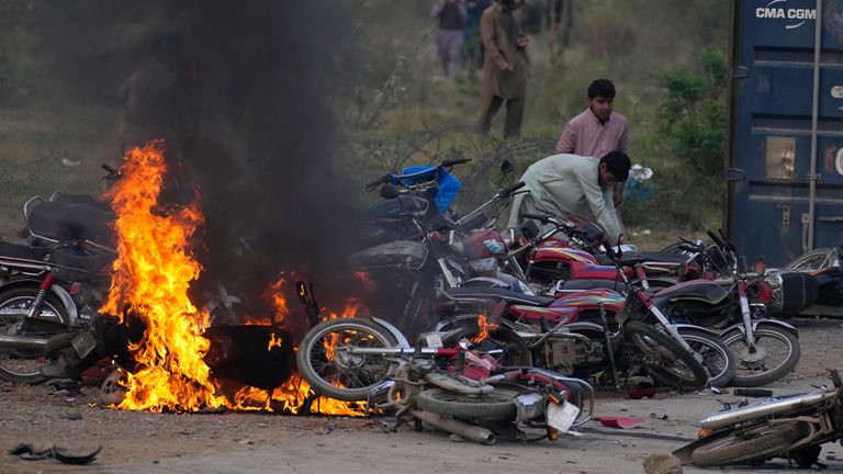 Clashes in Islamabad meant Mr Khan was unable to reach the courtroom 