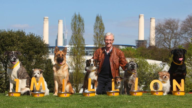 EMBARGOED UNTIL 0001 TUESDAY MAY 7, 2013.EDITORIAL USE ONLY.Television personality Paul O...Grady with rescue dog...s {dog breed} XXXX, {dog breed} XXXX and {dog breed} XXXX at London...s Battersea Park launching Pedigree...s Feeding Brighter Futures campaign. PRESS ASSOCIATION Photo. Issue date: Tuesday May 7, 2013. Pedigree pledges to donate one million meals to rescue dogs across the UK, . Photo credit should read: Geoff Caddick/PA..