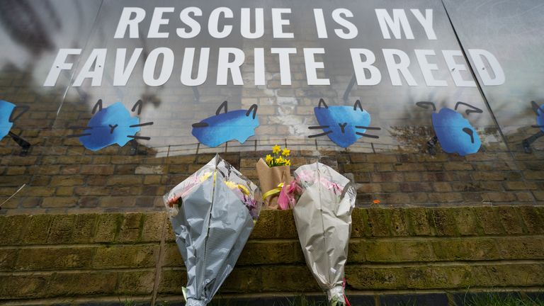 Flowers are left at Battersea Cats & Dogs Home in south London, where TV presenter and comedian Paul O&#39;Grady worked as the charity&#39;s ambassador