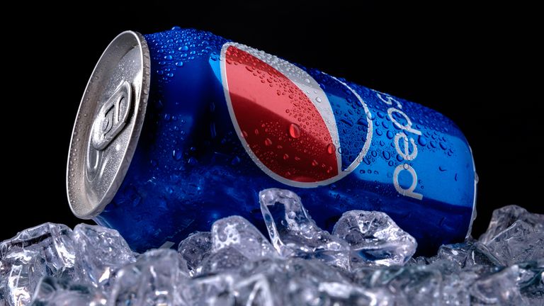 MINSK, BELARUS-AUGUST 16, 2015: Can of Pepsi cola on ice. Pepsi is a carbonated soft drink that is produced and manufactured by PepsiCo. Created and developed in 1893.