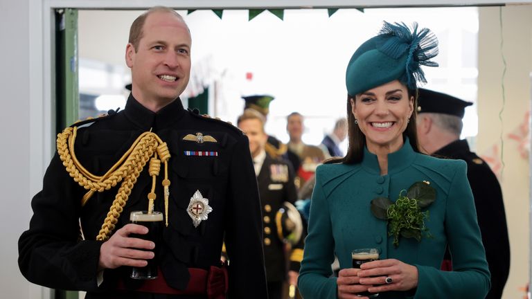 The Prince and Princess of Wales meet with members of the Irish Guards and their families and enjoy a glass of Guinness during a visit to the 1st Battalion Irish Guards for the St Patrick&#39;s Day Parade, at Mons Barracks in Aldershot. Picture date: Friday March 17, 2023.