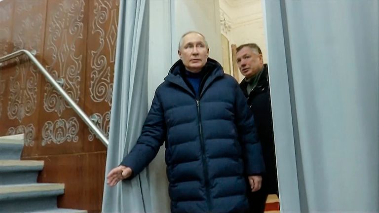 In this photo taken from video released by Russian TV Pool on Sunday, March 19, 2023, Russian President Vladimir Putin escorting by Russian Deputy Prime Minister Marat Khusnullin visits the Mariupol theater during his visit to Mariupol in Russian-controlled Donetsk region, Ukraine. Putin has traveled to Crimea to mark the ninth anniversary of the Black Sea peninsula&#39;s annexation from Ukraine (Pool Photo via AP)


