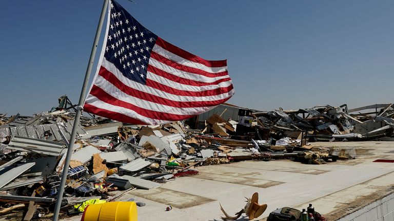 An American flag stands on a slab at a hardware store in Rolling Fork.Photo: Associated Press