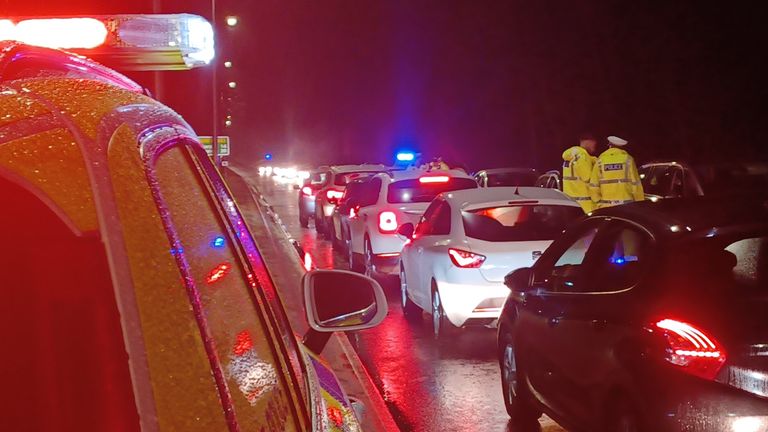 A road check one week on after a 60-year-old woman was struck by a vehicle on the A6091 near Melrose at around 9.50pm on Sunday 12 March. Pic: Police Scotland