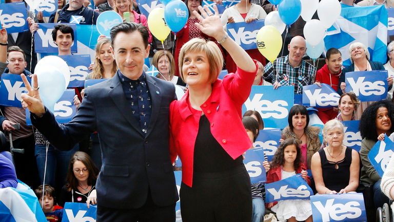 Deputy First Minister of Scotland Nicola Sturgeon and actor Alan Cumming outside the Yes Kelvin campaign hub in Glasgow ahead of the Scottish independence referendum vote on September 18.