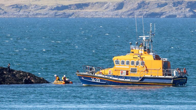 Oban lifeboat launches its daughter craft to reach the casualty on Maiden Island. Image: Stephen Lawson/RNLI