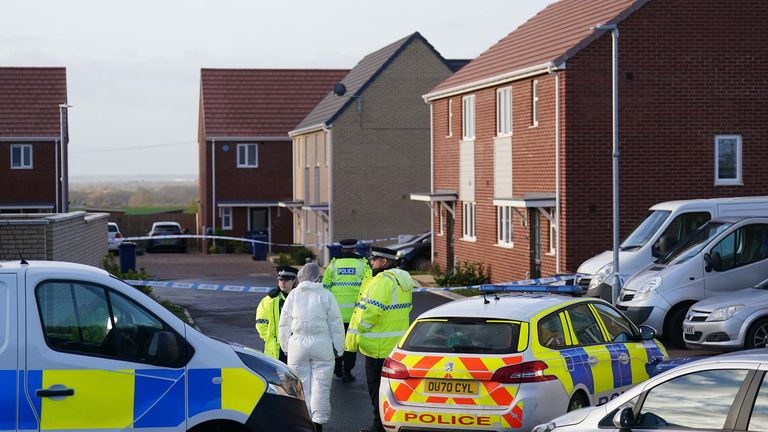 Police and forensics at the scene in Meridian Close, Bluntisham, Cambridgeshire, where police found the body of a 32-year-old man with a gunshot wound 
