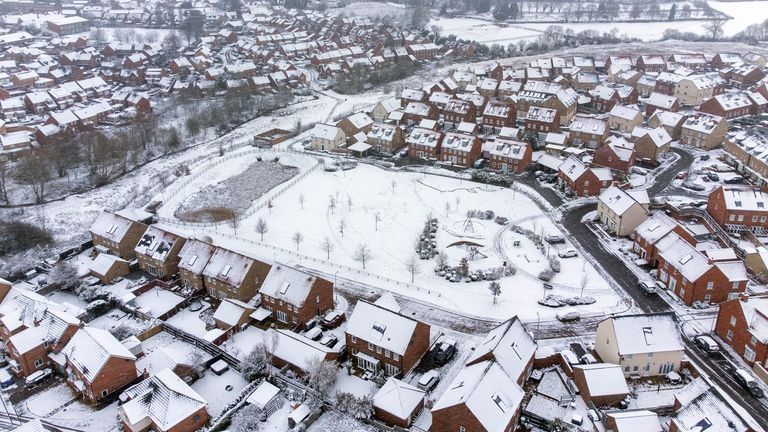 Heavy snow cover houses in Burton Latimer, Northamptonshire