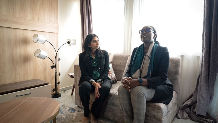Suella Braverman visits a newly built house with Minister for Information, Communication and technology, Claudette Irere in Rwanda