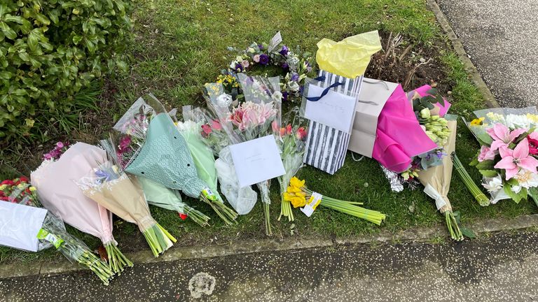 Floral tributes were laid outside the home