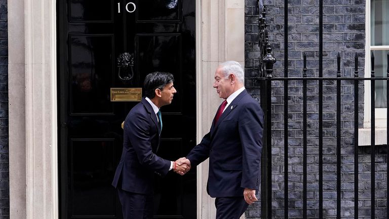 Britain&#39;s Prime Minister Rishi Sunak, left, welcomes Israel Prime Minister Benjamin Netanyahu at Downing Street in London, Friday, March 24, 2023.(AP Photo/Alberto Pezzali)