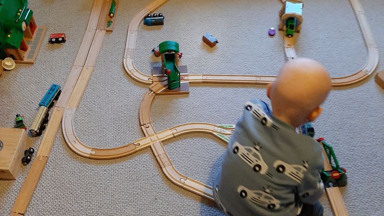 Three-year-old Teddy is obsessed with trains