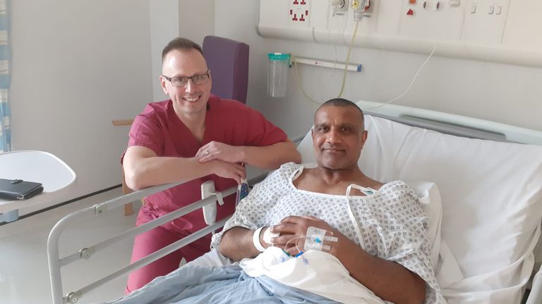 Thomas Moores, clinical director at Walsall Manor Hospital, with Jess Sansara, a patient undergoing surgery with the help of a robot.