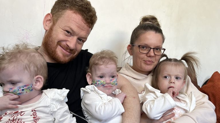 Michaela White and Jason Hopkins with Porscha-Mae (left), Payton-Jane and Rubi-Rose (right) Hopkins