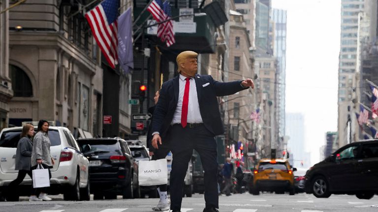 A person wearing a Trump mask in New York 