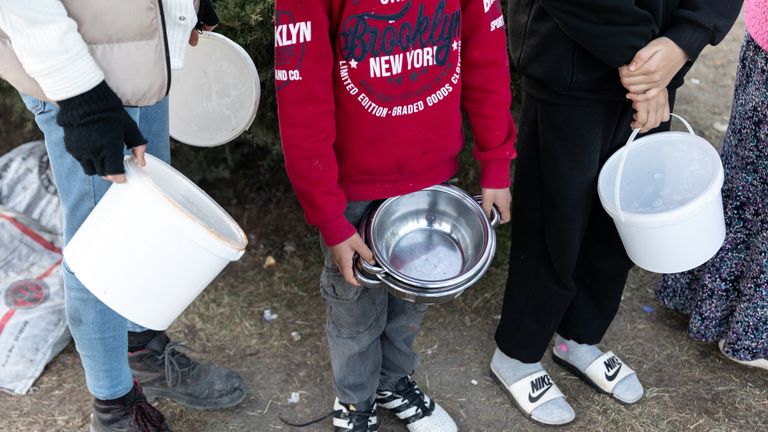 Children wait for food in the Turkish town of Beyoglu. Pic: Bradley Secker/DEC