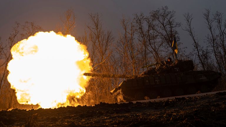 A Ukrainian tank fires towards Russian positions on the front line near Bakhmut, Ukraine.  Pic: AP