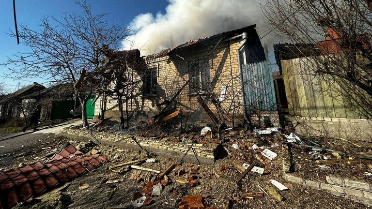 A house burns following a missile strike in the southern port city of Kherson. Pic: Ukraine&#39;s Presidential Office/via Reuters