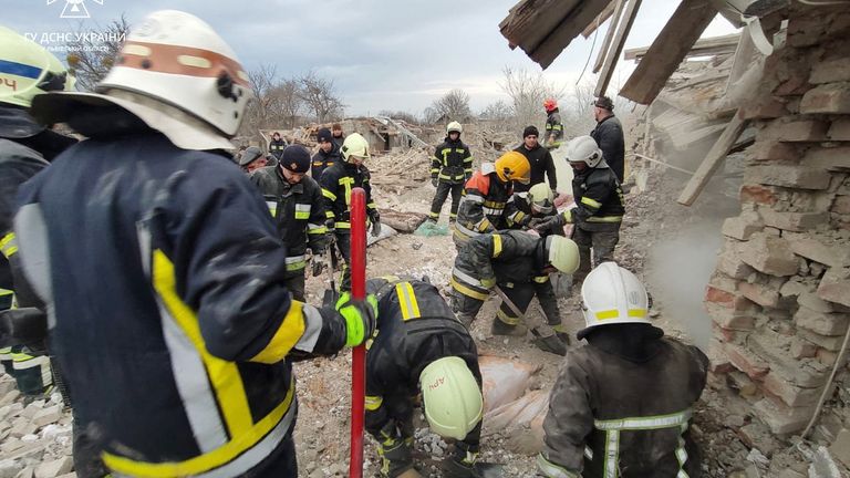 Rescuers in a residential area destroyed in the Russian airstrikes in the Lviv region. Pic: State Emergency Service of Ukraine/via Reuters