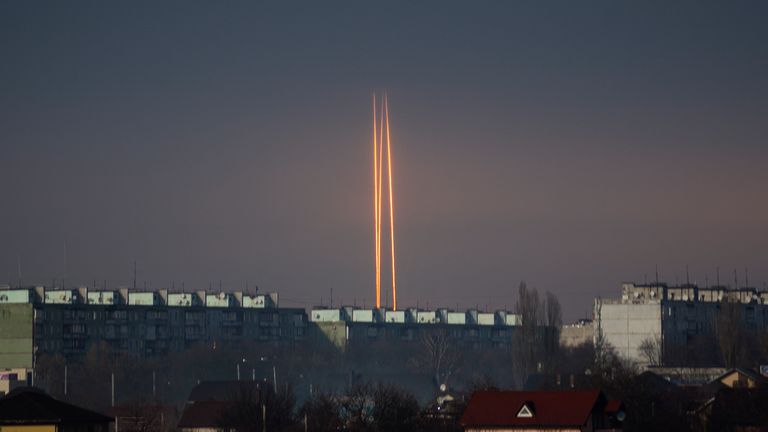 Three Russian rockets launched against Ukraine from Russia&#39;s Belgorod region are seen at dawn in Kharkiv, Ukraine, late Thursday, March 9, 2023. (AP Photo/Vadim Belikov)