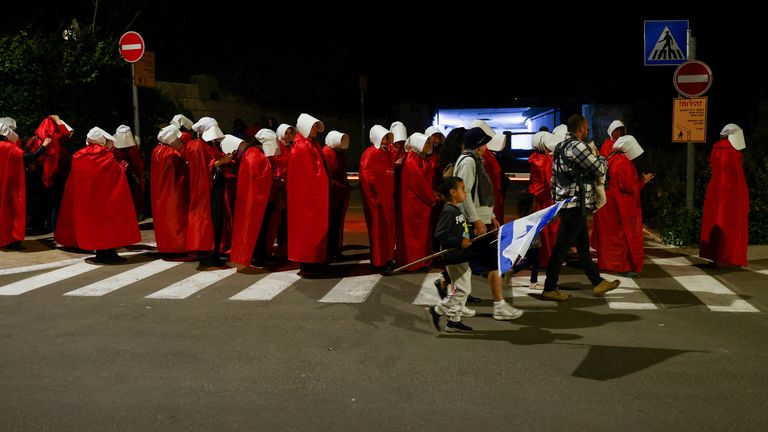 Israeli women&#39;s rights activists dressed as characters in the TV series The Handmaid&#39;s Tale