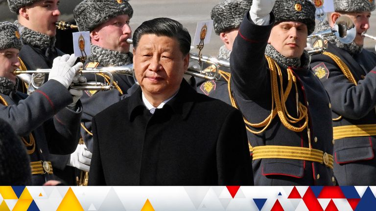 Chinese President Xi Jinping walks past honour guards and members of a military band during a welcoming ceremony upon his arrival at an airport in Moscow, Russia, March 20, 2023. Kommersant Photo/Anatoliy Zhdanov via REUTERS RUSSIA OUT. NO COMMERCIAL OR EDITORIAL SALES IN RUSSIA.