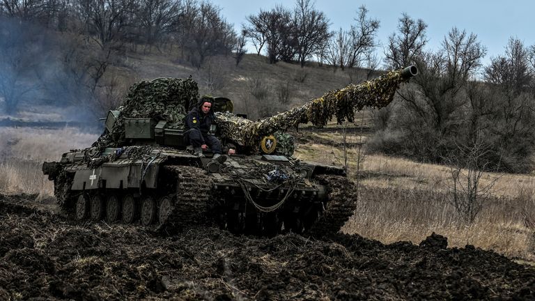 Ukrainian servicemen ride atop of a tank at a position near a frontline, amid Russia&#39;s attack on Ukraine, in Zaporizhzhia region, Ukraine March 16, 2023. REUTERS/Stringer