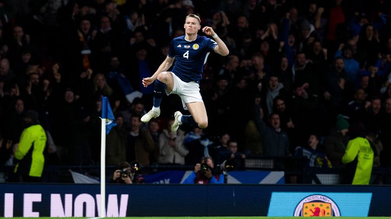 Scott McTominay celebrates his opener for Scotland against Spain