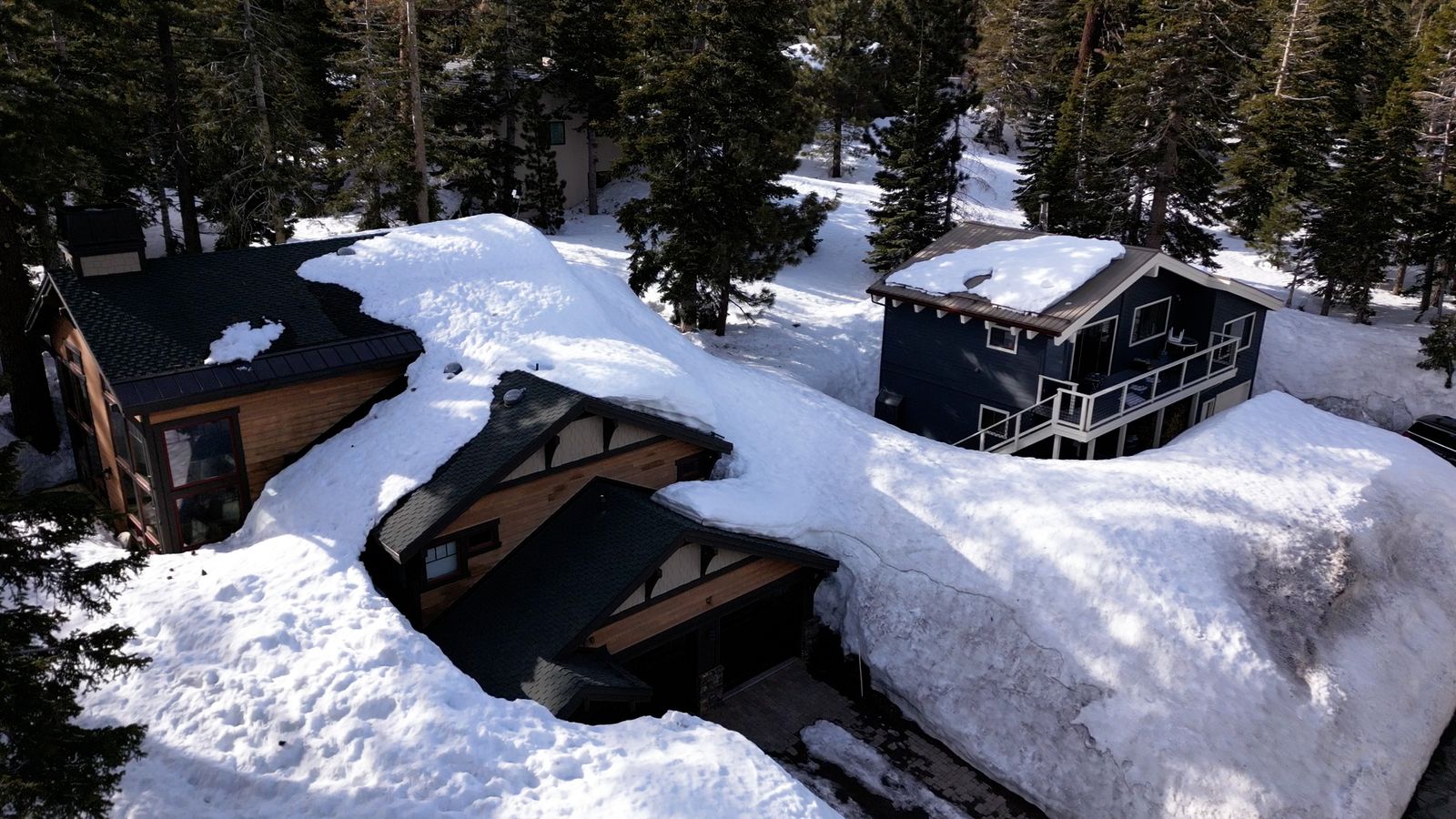 The Big Melt: Crushed houses, trapped cars and the threat of floods - inside California's buried ski resort