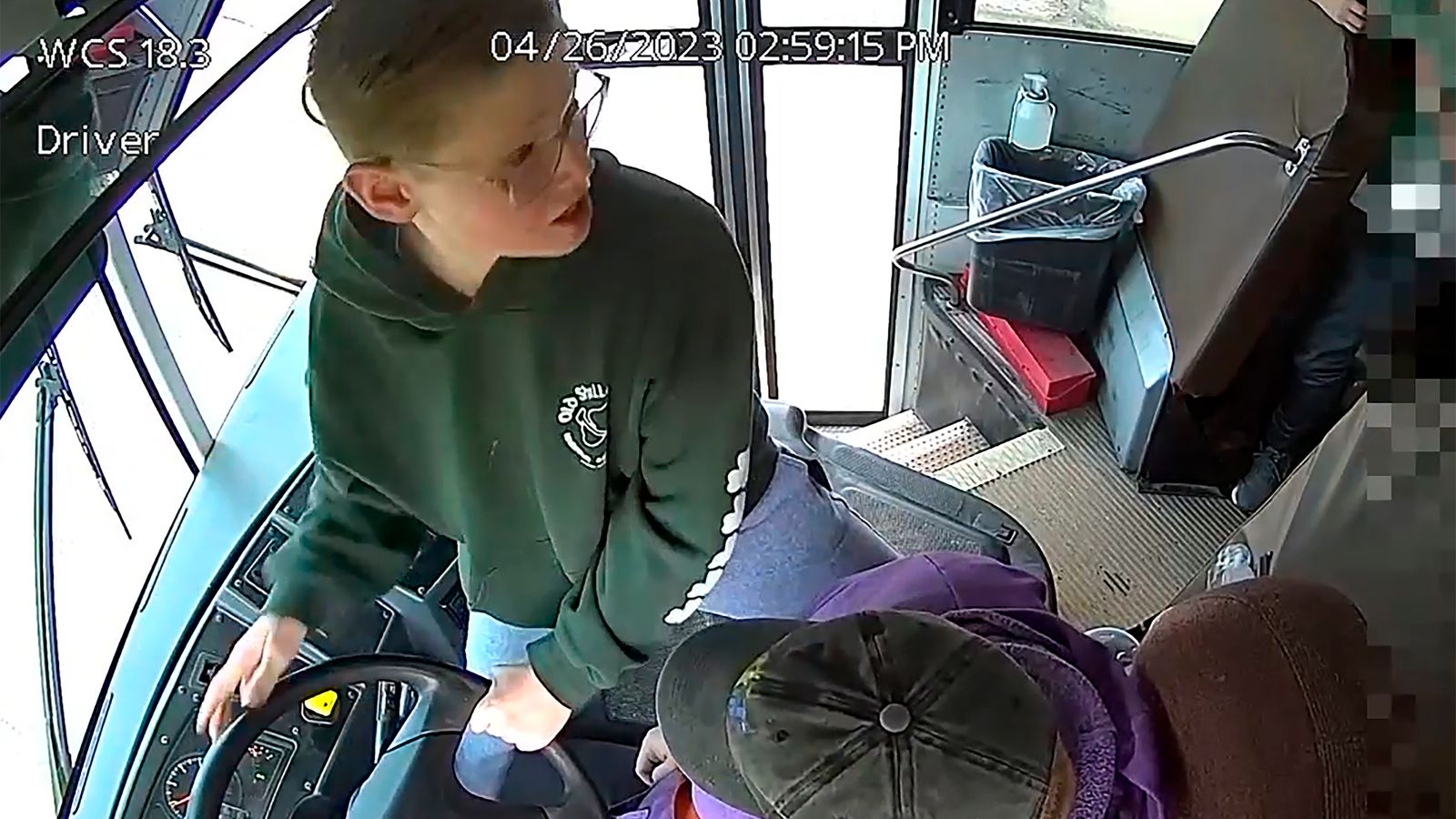 'Little hero' steers school bus to safety in Michigan after driver passes out at wheel