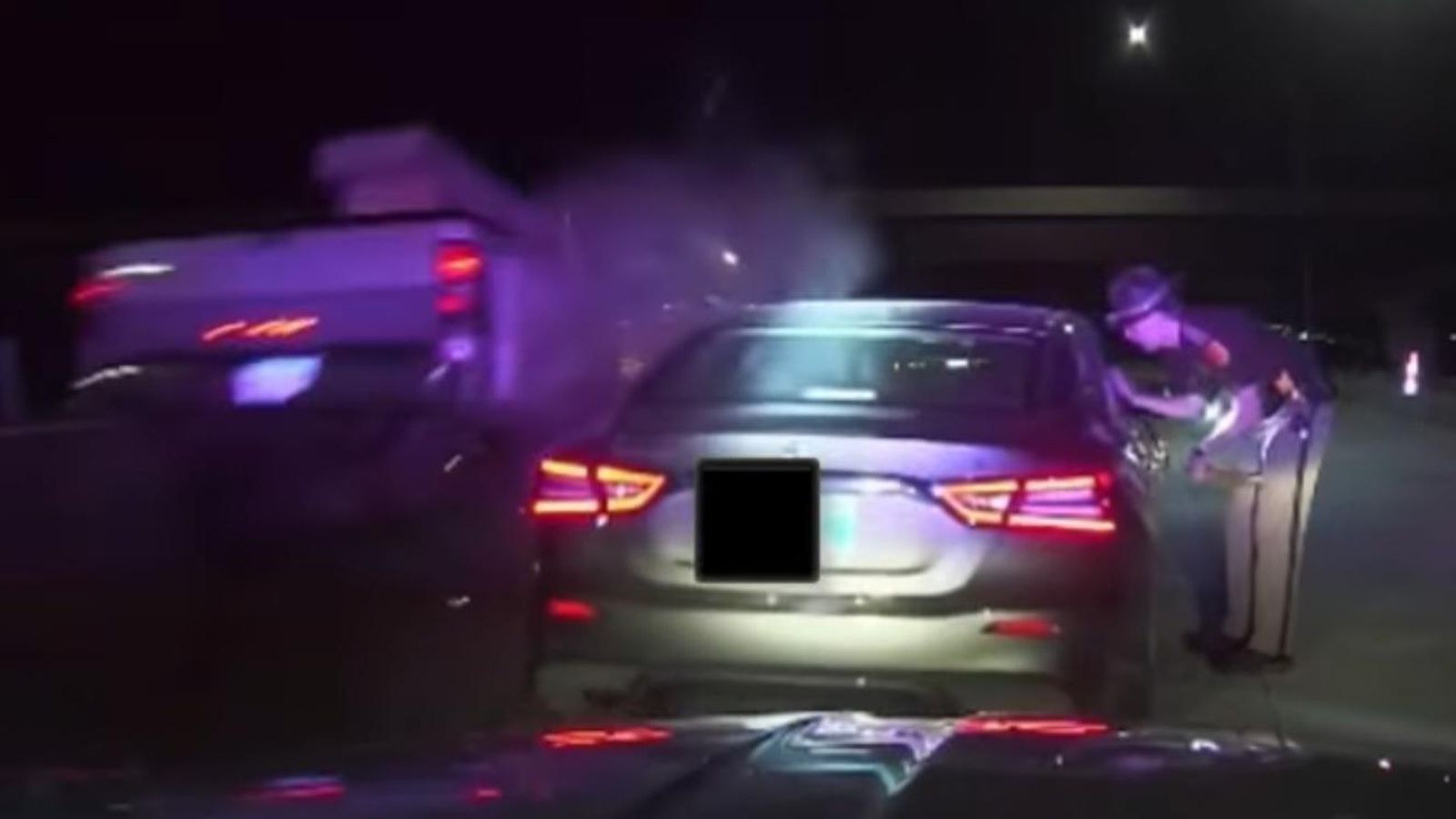 Truck smashes into car during traffic stop in Iowa | US News | Sky News