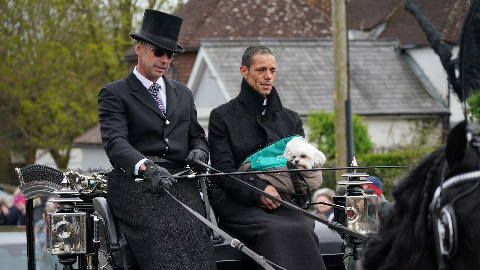 Celebrities arrive for Paul O'Grady's funeral as dogs line the streets