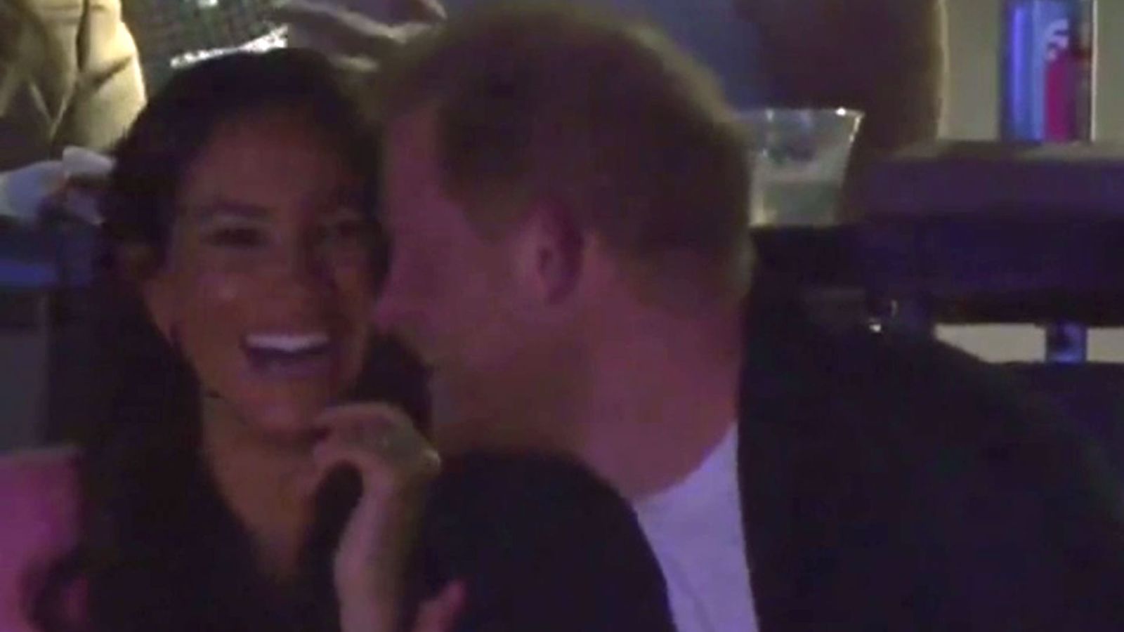 Prince Harry and Meghan seen on 'kiss cam' as their faces are beamed to ...