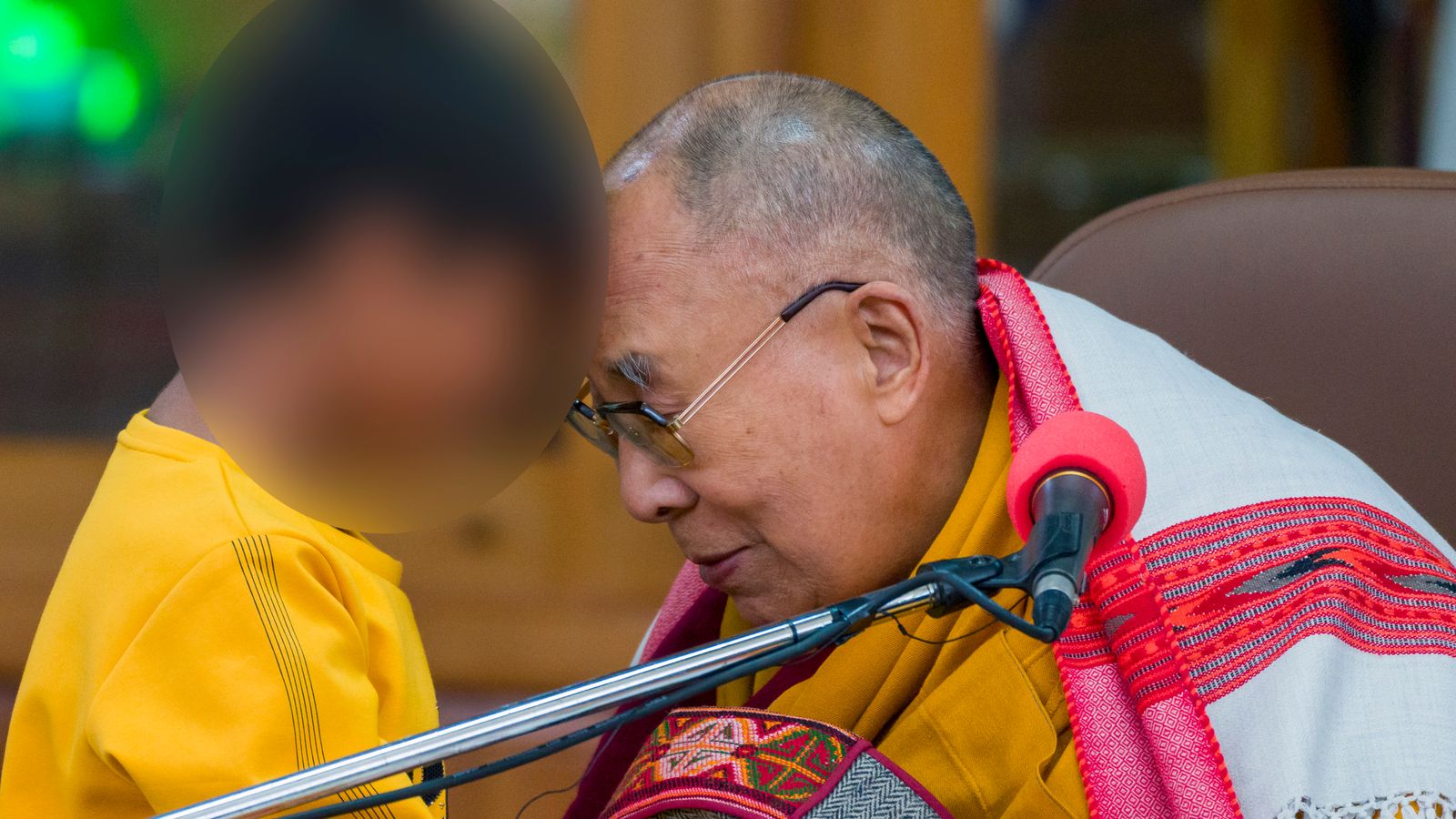 Dalai Lama apologises after kissing boy and asking him to 'suck my tongue'