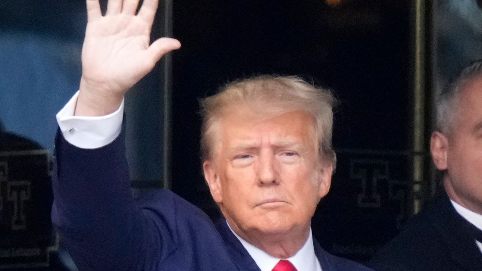 Donald Trump arrives at New York courthouse to be charged in historic moment