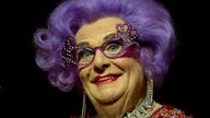 Australian TV presenter Barry Humphries performs on stage as Dame Edna for the Farewell Tour, at the London Palladium theatre, in central London, Wednesday, Nov. 13, 2013.