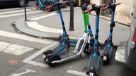 E-scooters from three different providers are parked in designated parking spaces in Paris. Pic: AP