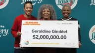 Geraldine Gimblet collecting her prize winnings with her granddaughter and daughter. Pic: Florida Lottery