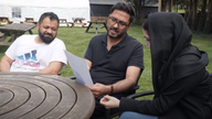 Mohammed, Waheed and Sharareh reading the letter