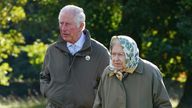PABest Queen Elizabeth II and Prince of Wales (known as the Duke of Rothesay when in Scotland), walk to the Balmoral Cricket Pavilion to mark the start of the official planting season for the Queen's Green Canopy (QGC) at the Balmoral Estate. Picture date: Friday October 1, 2021.


