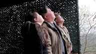 North Korean leader Kim Jong Un and his daughter Kim Ju Ae watch a test launch of a new solid-fuel intercontinental ballistic missile (ICBM) Hwasong-18 at an undisclosed location