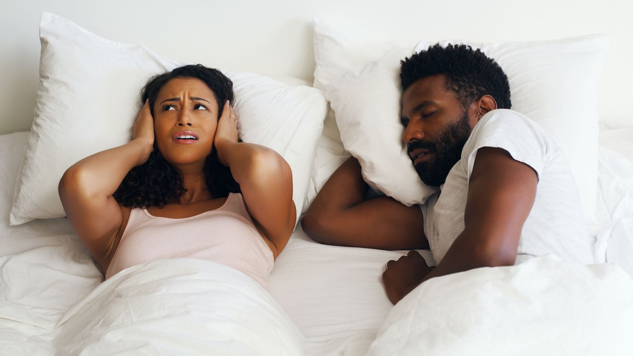 Should You Share a Bed With Your Partner? Sleep Scientists Break It Down