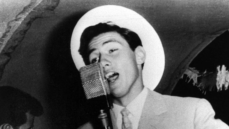 A young Silvio Berlusconi singing on a Cruise ship

