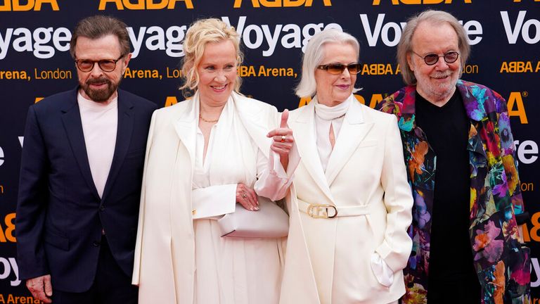 Members of ABBA, from left, Bjorn Ulvaeus, Agnetha Faltskog, Anni-Frid Lyngstad and Benny Andersson arrive for the ABBA Voyage concert at the ABBA Arena in London, Thursday May 26, 2022. ABBA is releasing its first new music in four decades, along with a concert performance that will see the "Dancing Queen" quartet going entirely digital. The virtual version of the band will begin a series of concerts on Thursday. (AP Photo/Alberto Pezzali)