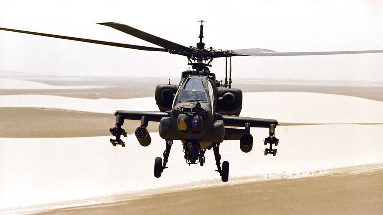 An American AH-64 “Apache” gunship flies over Saudi Arabia on Friday, August 24, 1990 as part of Operation: Desert Shield. Capable of firing two pods of rockets and up to 16 “Hellfire” missiles, this “Apache” and others from the 101st Airborne will provide defense against the threat of Iraqi tanks. (AP Photo/Scott Applewhite)