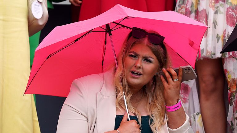 A racegoer during day two of the Randox Grand National Festival at Aintree Racecourse, Liverpool. Picture date: Friday April 14, 2023.