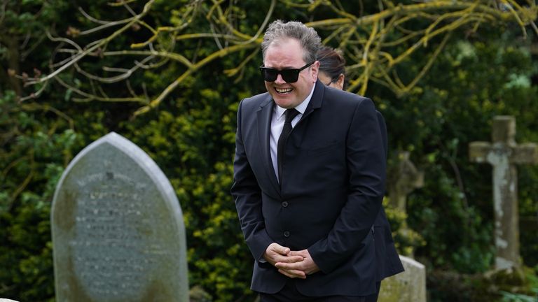 Alan Carr arriving for the funeral of Paul O&#39;Grady at St Rumwold&#39;s Church in Aldington, Kent. Picture date: Thursday April 20, 2023.