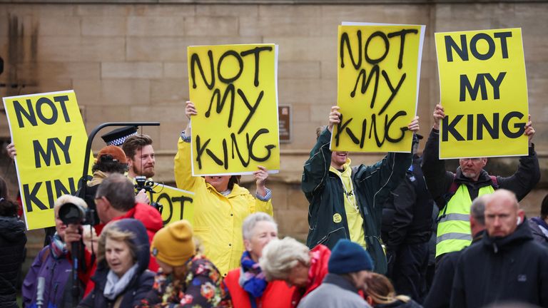Anti-monarchy protestors hold signs as they demonstrate near the York Minster in York, Britain, April 6, 2023. REUTERS/Phil Noble
