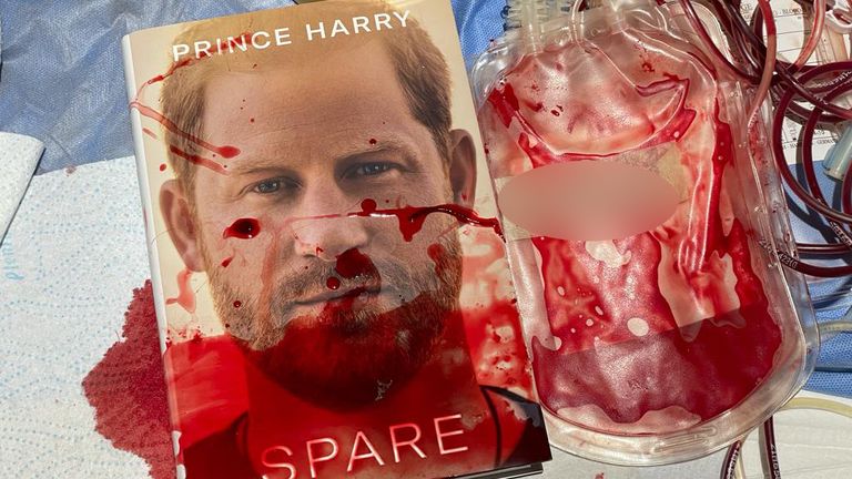 Artist Andrei Molodkin says he has smeared 25 copies of Prince Harry&#39;s memoir with blood donated by Afghans